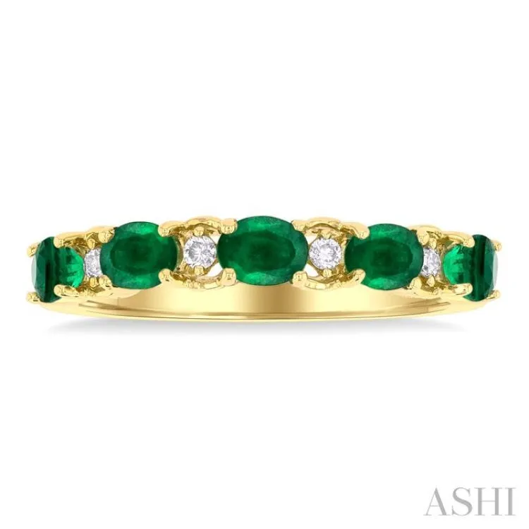 4X3MM East-West Set Oval Cut Emerald and 1/20 ctw Round Cut Diamond Precious Band in 14K Yellow Gold