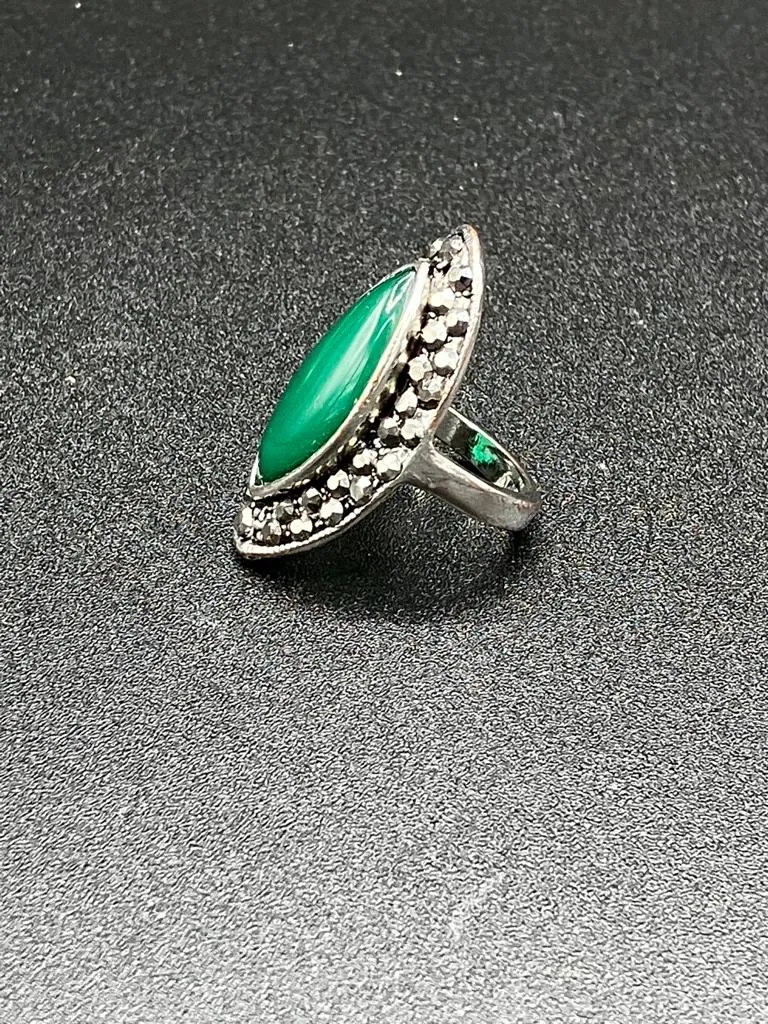 Adjustable Silver ring with green semi-precious gem afghan style